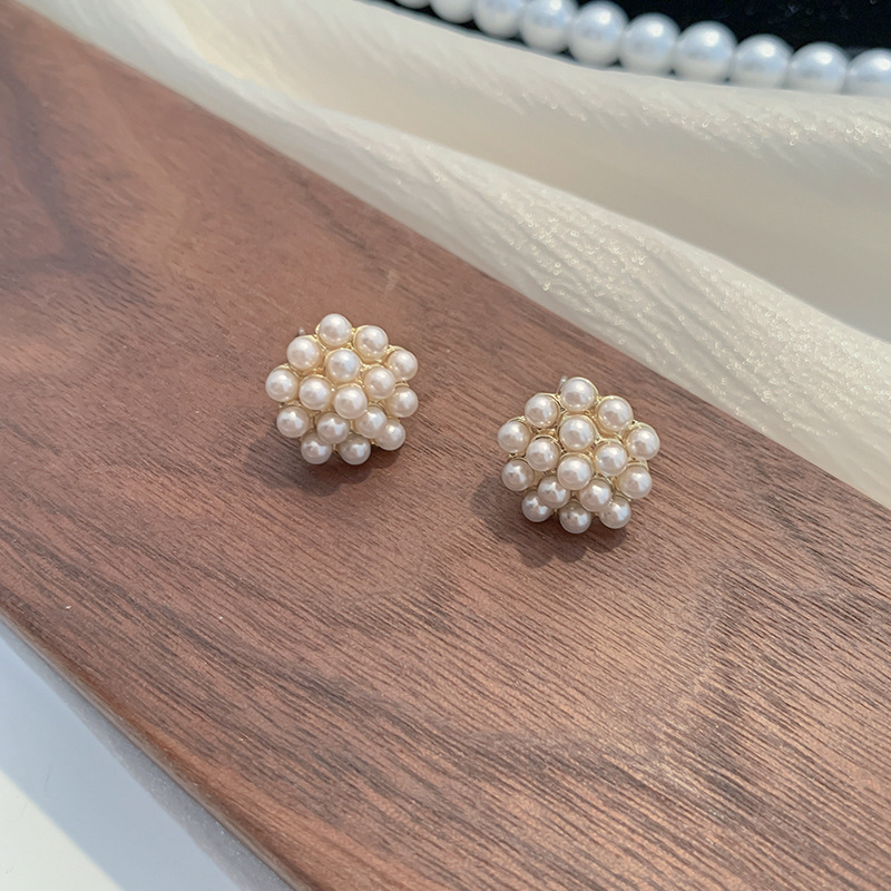 Golden ear clips from pearl