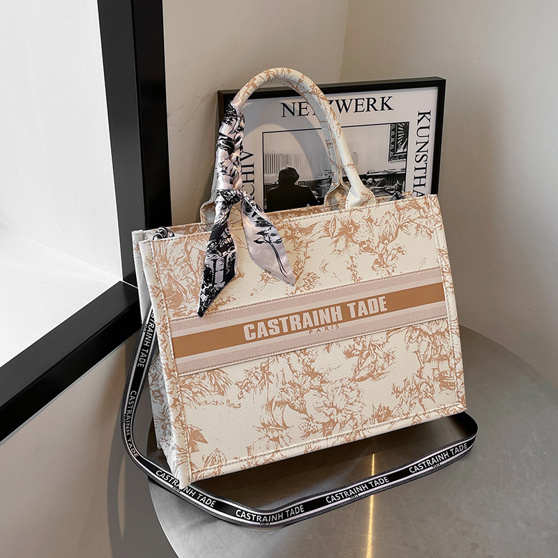 Bolsos de lona transfronterizos bolsos de mujer 2025 nueva moda retro letras impresas bolsos de hombro de gran capacidad