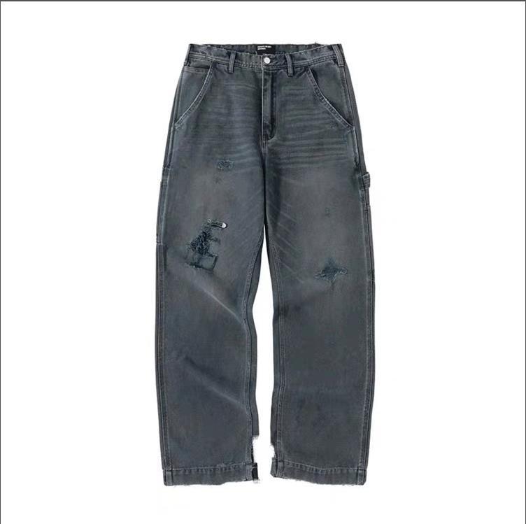 Jeans uomo loose gamba dritta lavaggio denim con strappi_voghion.com