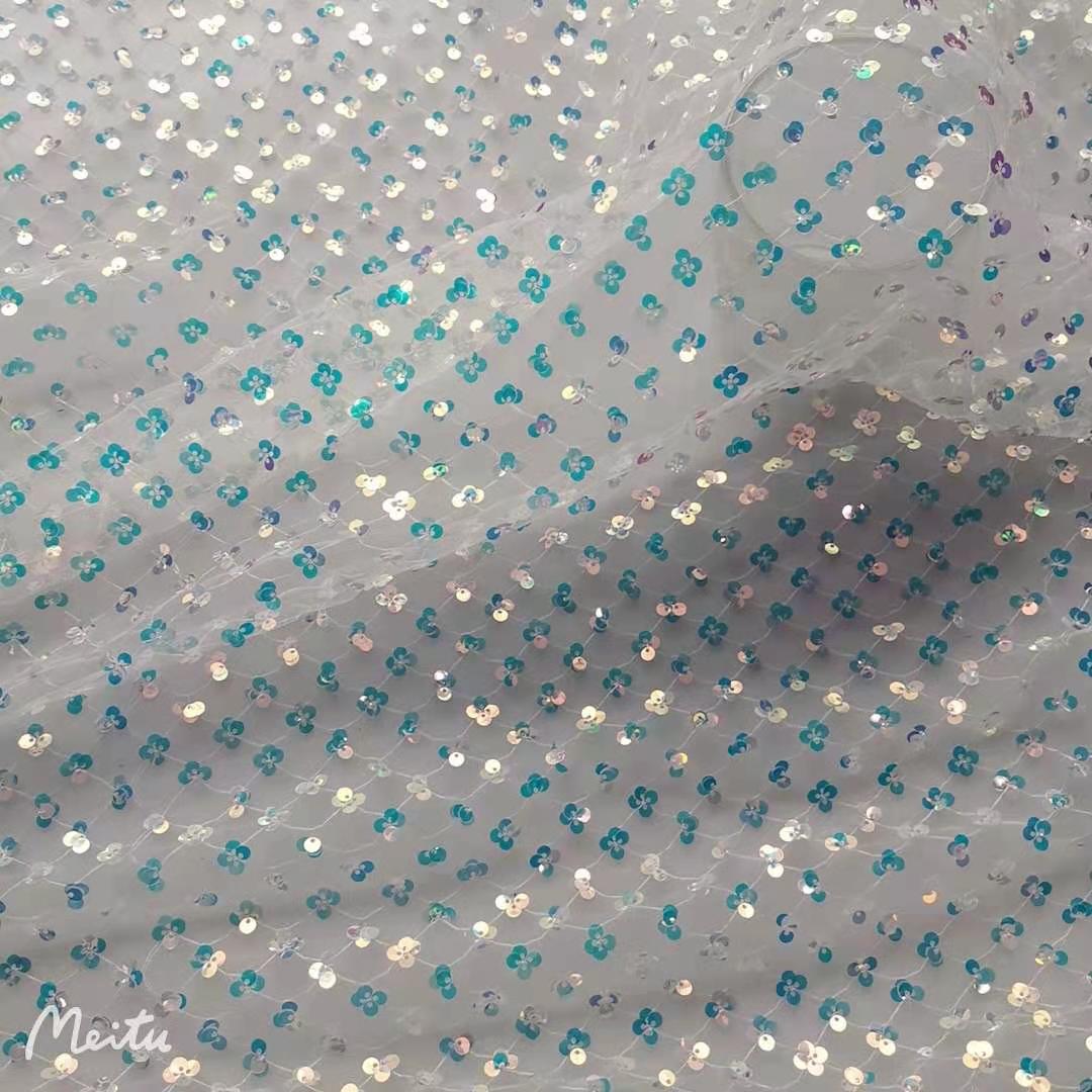【新品】瑞士网菱形交叉四瓣小花幻彩亮片绣 闪亮款时装礼服面料