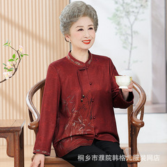 お年寄りの春の服の女性のおばあさんのシャツの新型の長袖の赤いお母さんの春と夏の上着のおばあさんの老人の服