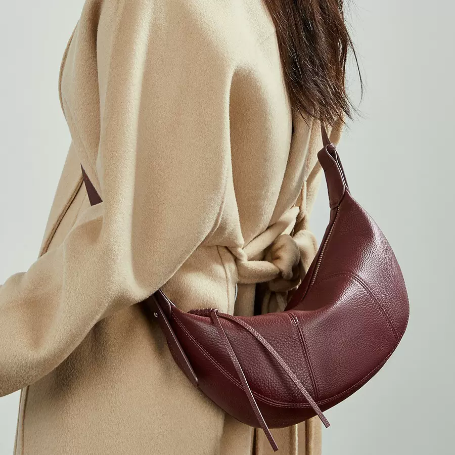 头层牛皮女包大容量新款牛角包小众单肩腋下斜挎包真皮通勤饺子包