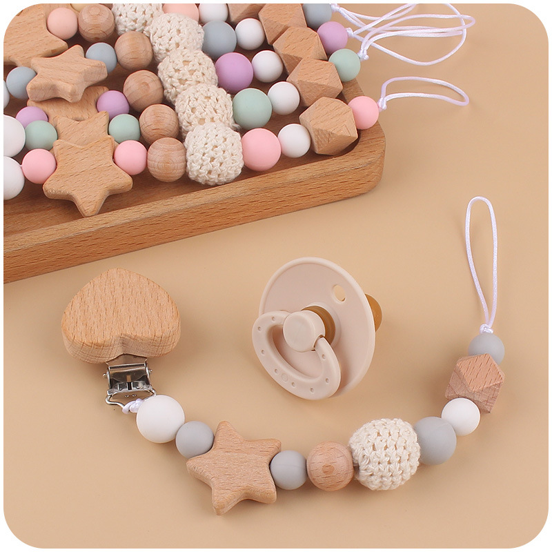 Nuevo bebé suministros de dibujos animados melocotón corazón chupete cadena chupete mordedura chupete cadena anti-gota conjunto de dos piezas