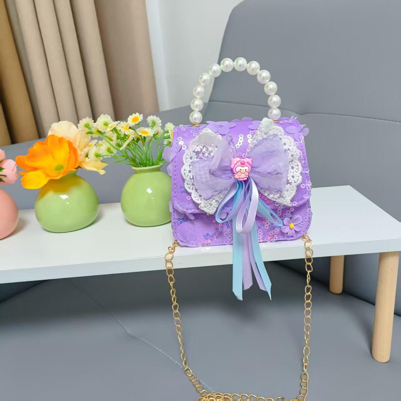 Bow princess pearl bolso Melody KT felino mochila accesorios de chicas pequeñas cadenas de viento fragante bolso para niños