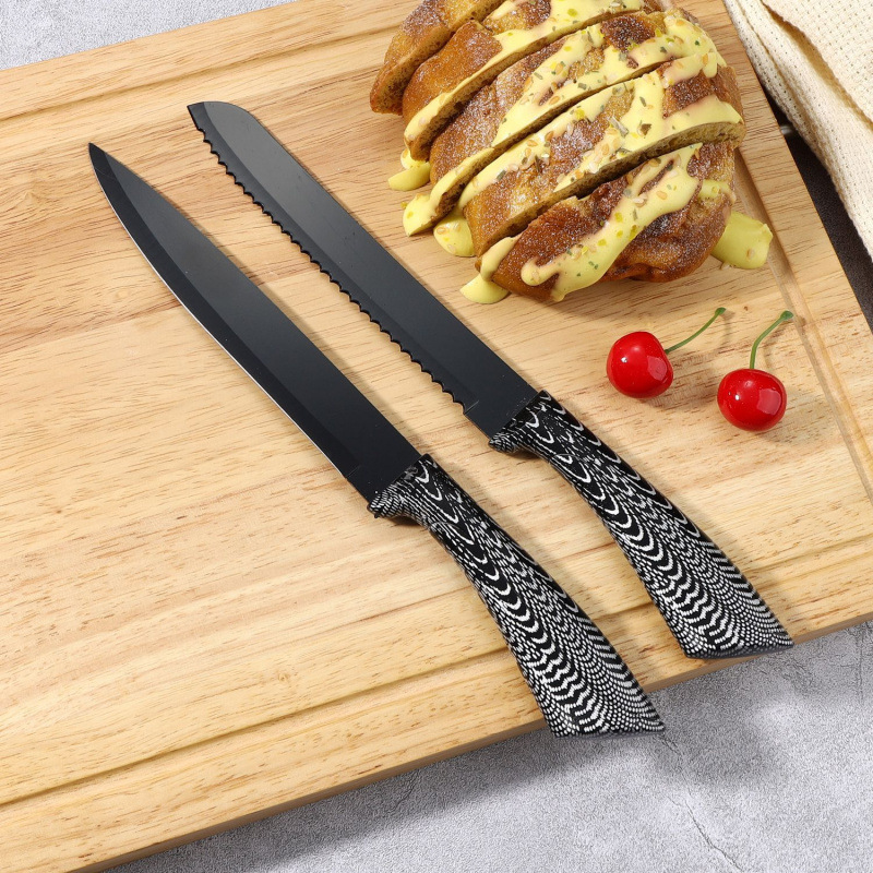 Fábrica transfronteriza spot de cuchillo doméstico cuchillo conjunto de nueve piezas mango de rayas blancas y negras conjunto acrílico asiento