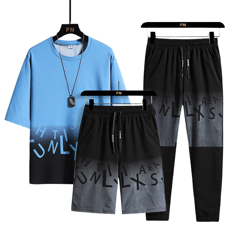 Traje casual de verano para hombres gran tamaño suelto mangas cortas cuello redondo camiseta pareja de dos piezas juego deportivo 7 pantalones cortos