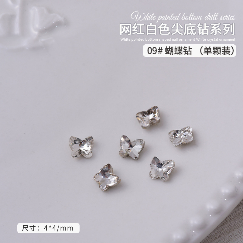 24- small butterfly 4*5mm *09