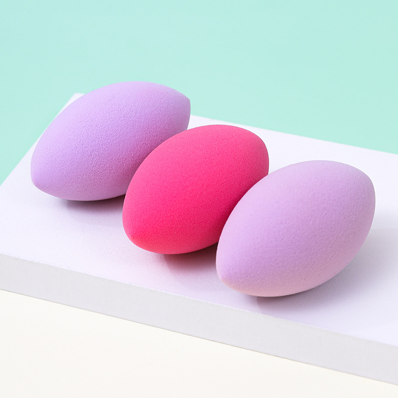 Fábrica personalizada ovalada belleza huevo soplo de polvo no come polvo no látex transfronterizo rugby maquillaje esponja huevo cojín de aire