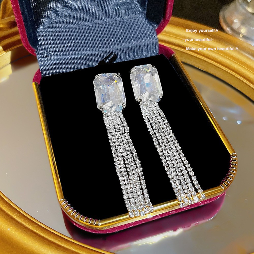S925 aguja de plata elegante borla pendientes de alta gama simple cara de adelgazamiento pendientes de todo fósforo estilo coreano nuevos pendientes de moda al por mayor