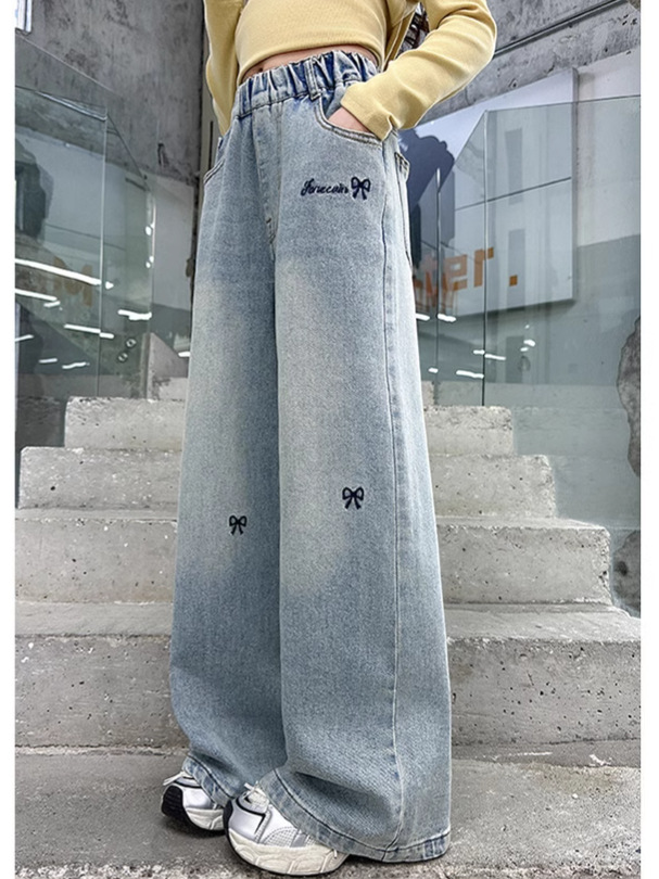 女の子の大きい子供のジーパンの春秋は2025新型の韓国版の洋風のカジュアルな広い足のズボンの女の子の春の金のゆったりしているズボンを詰めます。