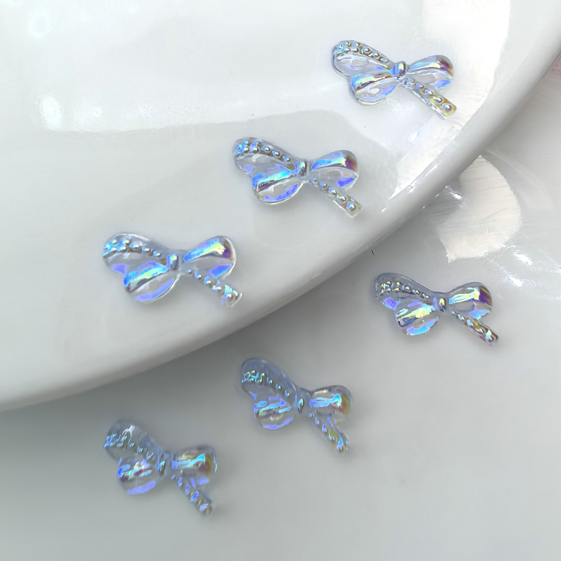 浅蓝色蝴蝶结美甲饰品批发海口重庆天津广州香港0007.jpg