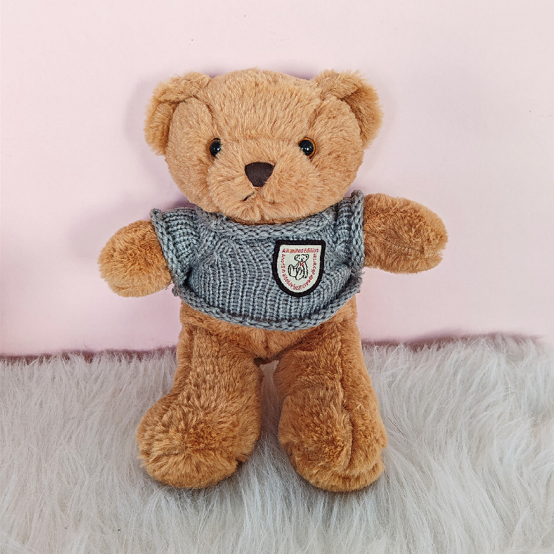 Lindo suéter oso muñeca peluche peluche oso muñeca regalo de cumpleaños máquina de captura muñeca al por mayor transfronteriza