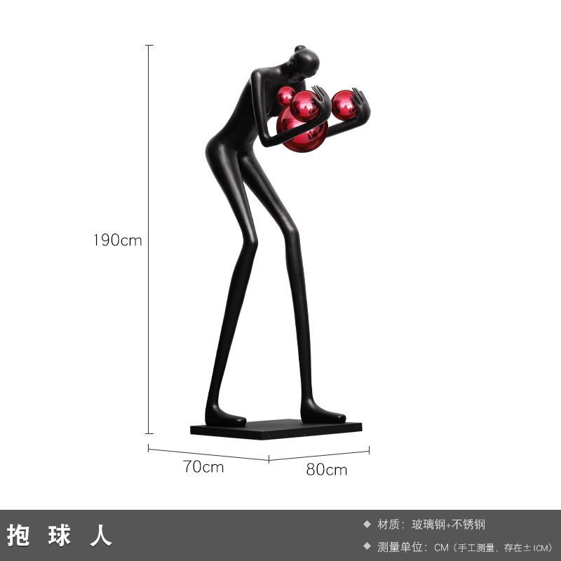 現代の抽象芸術はボールの人物の彫刻を抱きます。|undefined