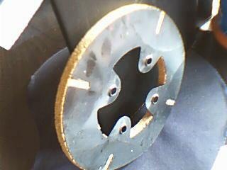 15#桌上车床圆型刹车片铁皮的一面1