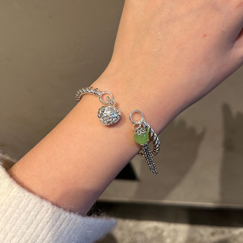 Una borla anillo de un solo paso Palacio Campana pulsera femenina ins nicho diseño estilo chino Bell pulsera novias regalo