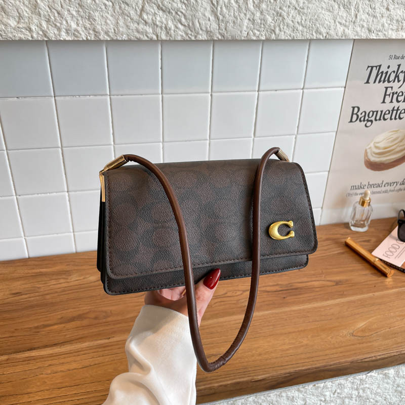Trendy underarm bag with high aesthetic value, hand-held, printed, light luxury, high-end, vintage, crossbody, stylish, versatile, with lettering, cross-border Trendy underarm bag with high aesthetic value, hand-held, printed, light luxury, high-end, vintage, crossbody, stylish, versatile, with lettering, cross-border