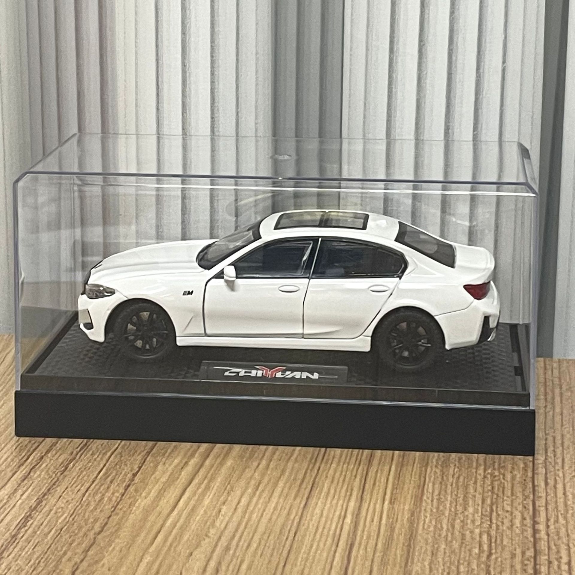 Zhongyuan xinghejin modelo de coche 1 a 32 baoma 3 encaje-up sonido y luz Tire hacia atrás juguete coche música modelo decoración caja de polvo