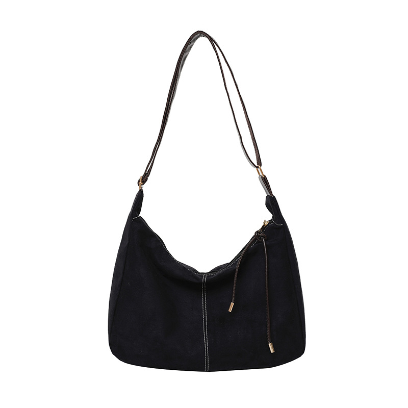 Bolsa grande simple para mujeres otoño y invierno 2024 nueva bolsa de hombro de gran capacidad de viento perezoso de viaje oblicuo bolso de moda