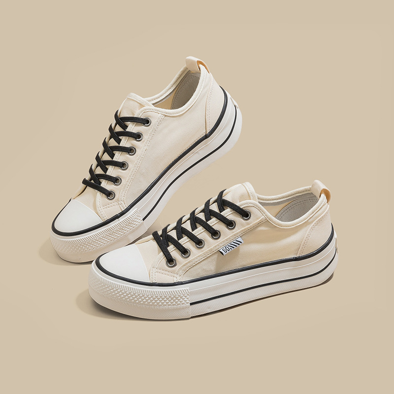 2026 primavera nuevo tipo de zapatos de lona de suela gruesa para mujeres aumentando la altura de los zapatos de deporte casuales con un pedaleo elástico zapatos de skate