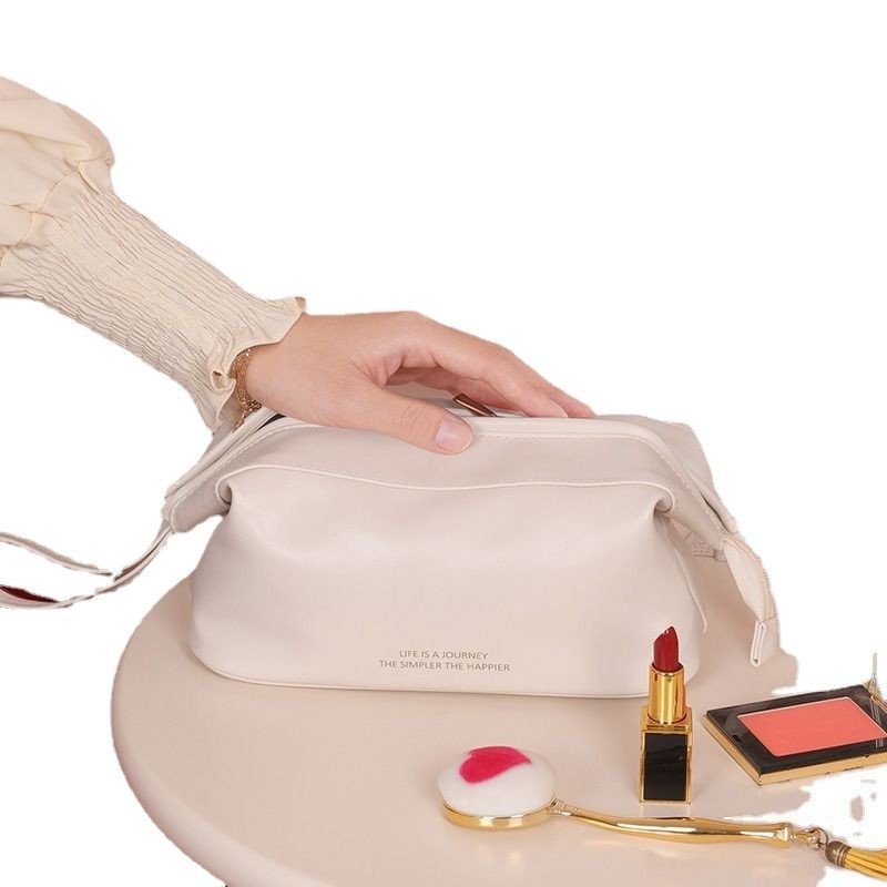 PU bolsa de cosméticos impermeable bolsa de lavado de nube de crema bolsa de cosméticos portátil de doble capa de gran capacidad y alto valor