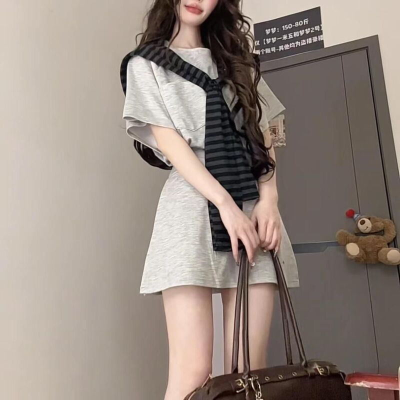 Korean-Style College-Style Skirt Suit for Women, Autumn 2026 New Age-Reducing Short-Sleeved T-Shirt Top and Shawl Three-Piece Set