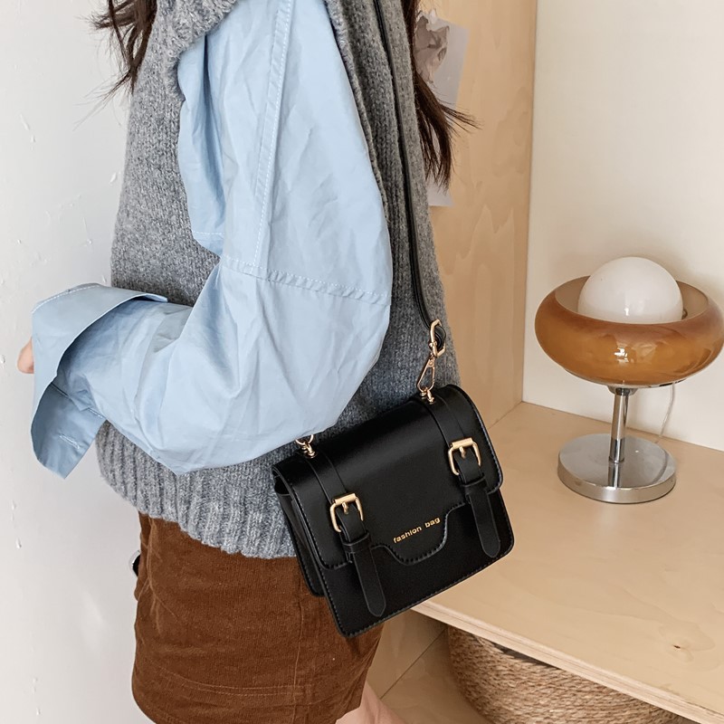 Nuevo cartero infantil Europa y América retro estilo británico universitario bolso de hombro para niños y niñas bolso de color sólido para niños