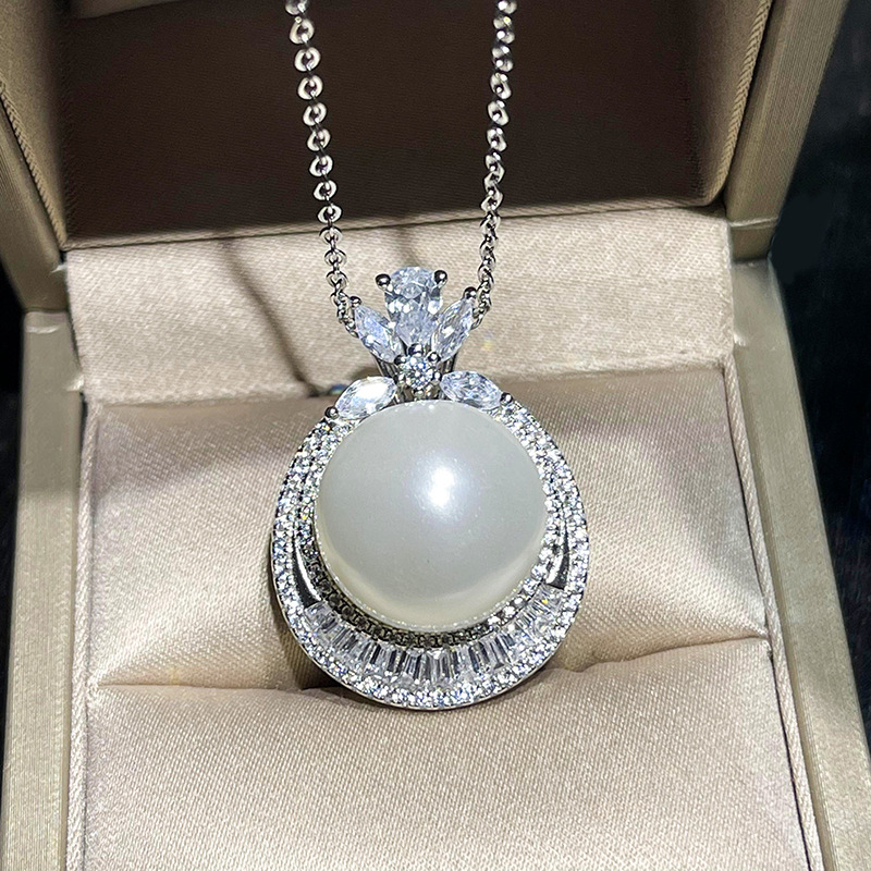 Zhuang Sheng joyería nueva S925 plata con incrustaciones aobei madre Zhen moda de las mujeres europeas y americanas perlas blancas traje 16 mm14mm