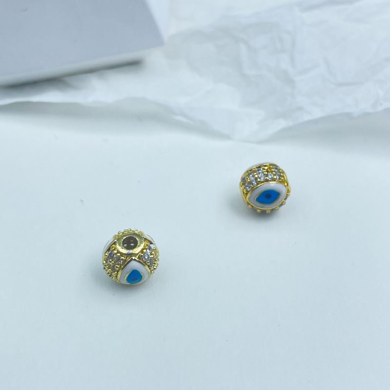 18k包みの金の保色の小さいはめ込みの透かし彫りのジルコンのボールのdiyのアクセサリの悪魔の目のブレスレットのビーズ|undefined