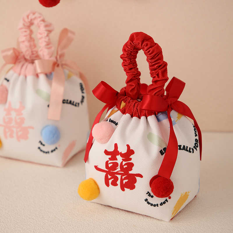 女性のブライズメイド用の結婚式のお返しギフトバッグ、ウェディングキャンディーバッグ、リストバッグ、新しい冬のお土産キャンディーボックス、中国のお祝いギフトボックス|undefined
