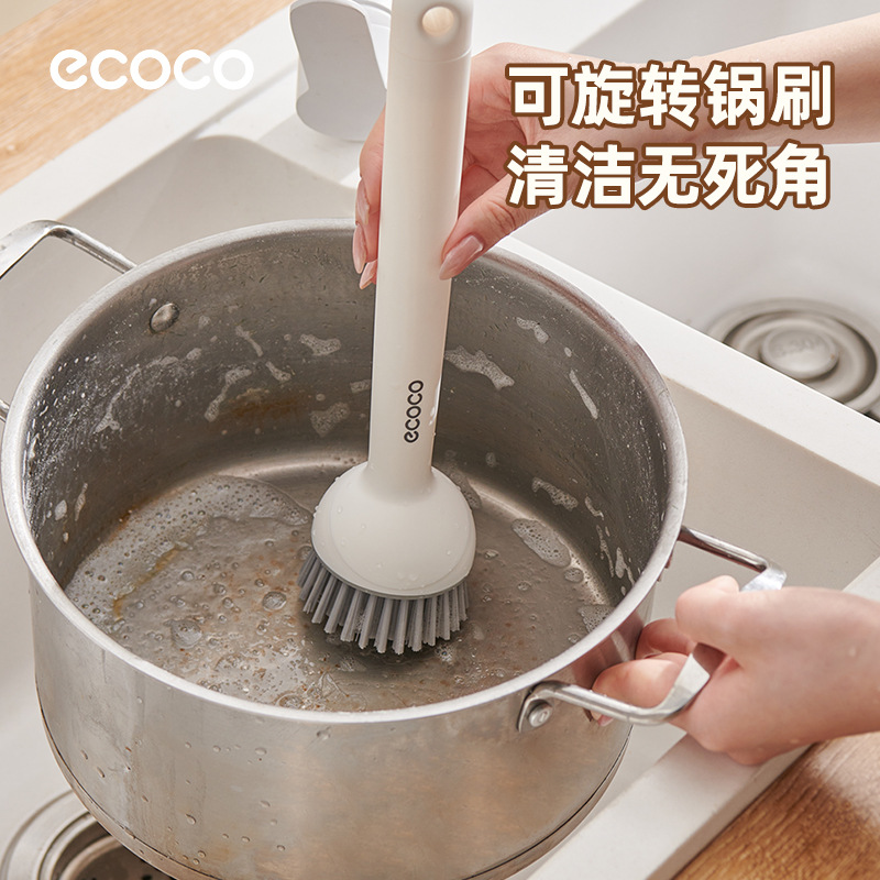 Cepillo para lavar platos y lavar ollas con mango de cepillo de extrusión de líquido creativo y mango largo giratorio.
