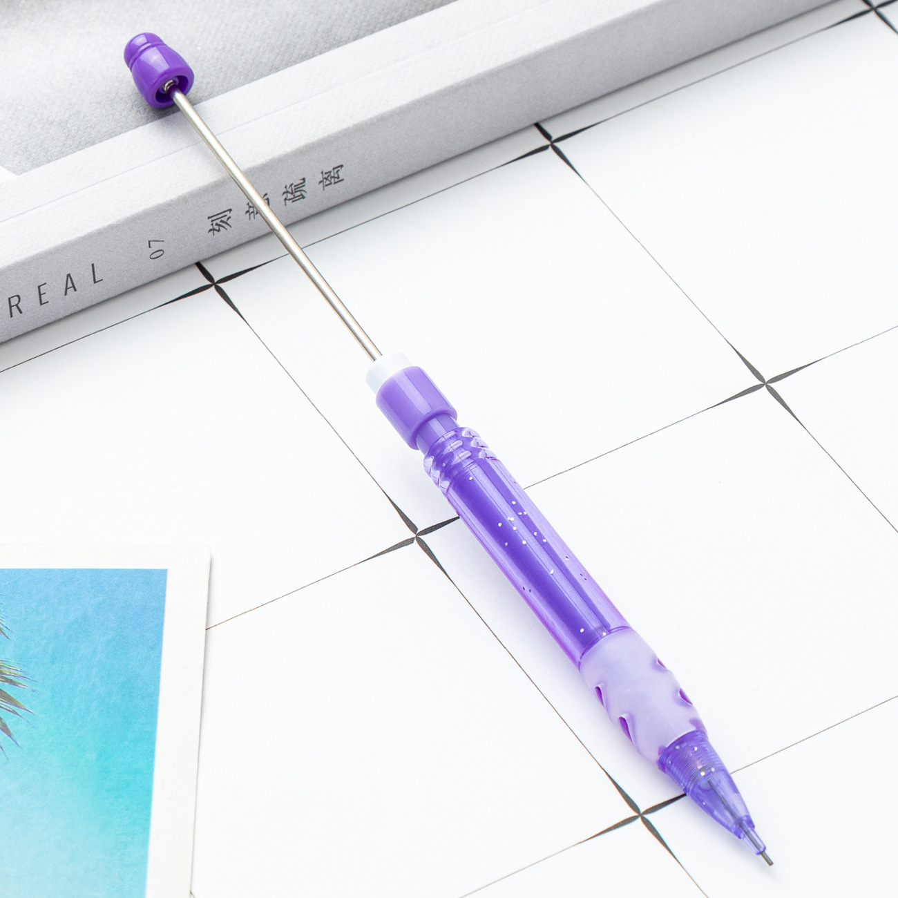 Nuevo lápiz automático con cuentas para estudiantes de primaria sin afilado 0.5 lápiz automático de núcleo continuo lindo lápiz de escritura