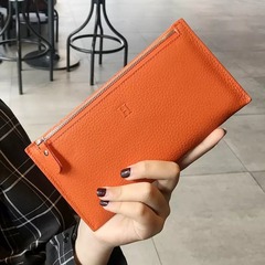 本革の財布の女性の長いタイプの2025新型の財布の超薄型の金の爆発的な手は革のはさみの小さい大衆の設計を持って精巧で高級です。