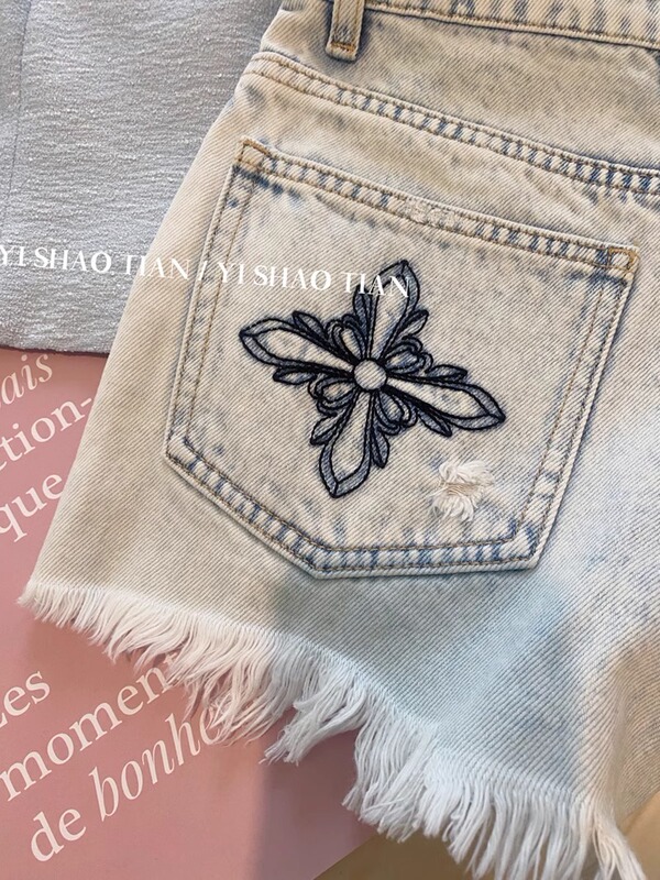 ウォッシュ加工のダメージ加工刺繍ローエッジデニムショートパンツ女性用2025年夏新作ハイウエスト甘くてクールなホットガールAラインホットパンツ|undefined