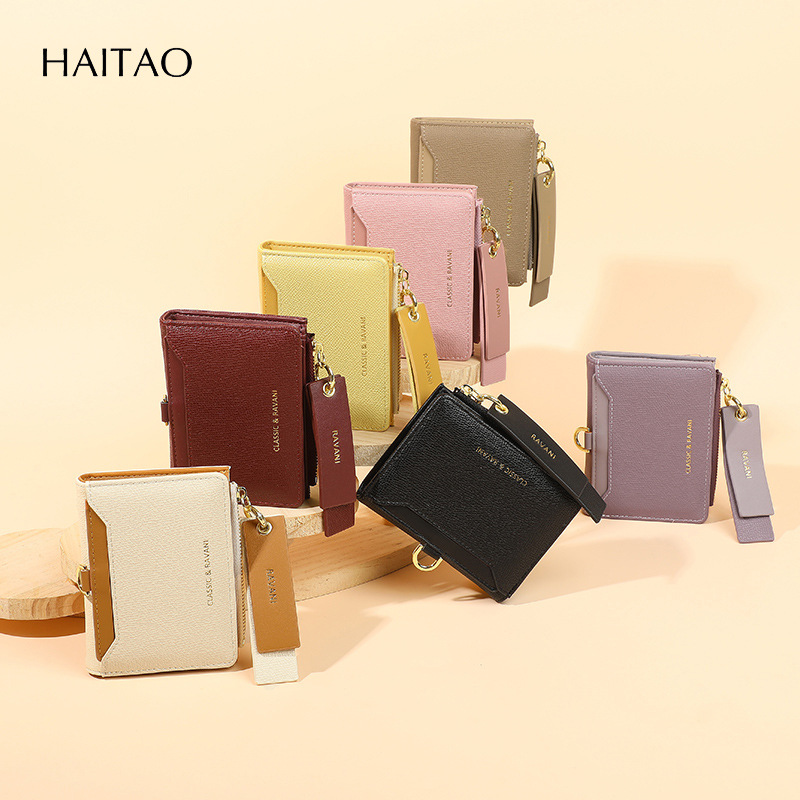 2025 nuevo tipo de bolso con tarjetas se puede colgar sin cuerdas, cartera corta doblada dos veces, bolso de cambio, bolso de tarjetas, viento