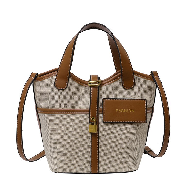 Nicho de diseño retrógrado lienzo portátil bolso de cubo de agua mujer 2026 nuevo cross-border ins canasta de moda bolso de mochila image 6
