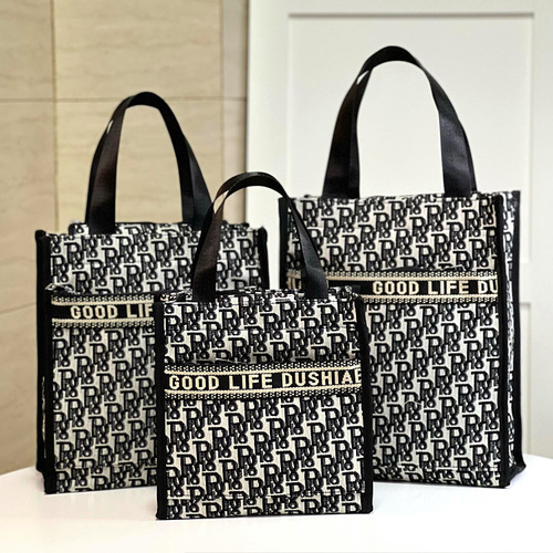 New Korean version is portable large-capacity hand-carrying commuter lunch box bag document tutoring bag mommy bag toiletry bag