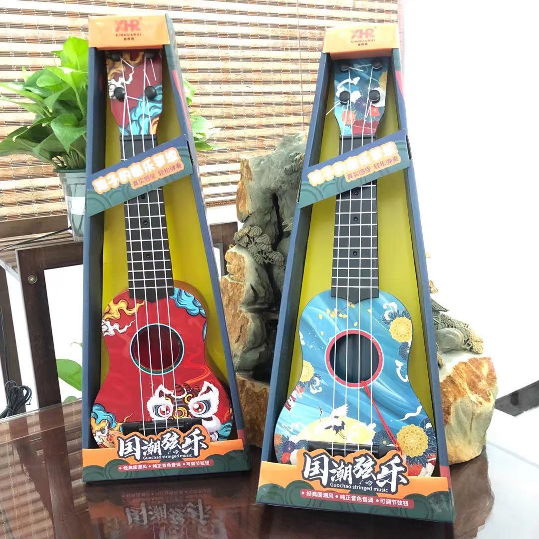 Instrumento musical de los niños simulación ukulele cuatro cuerdas puede jugar educación temprana música guitarra de juguete guitarra directa de fábrica