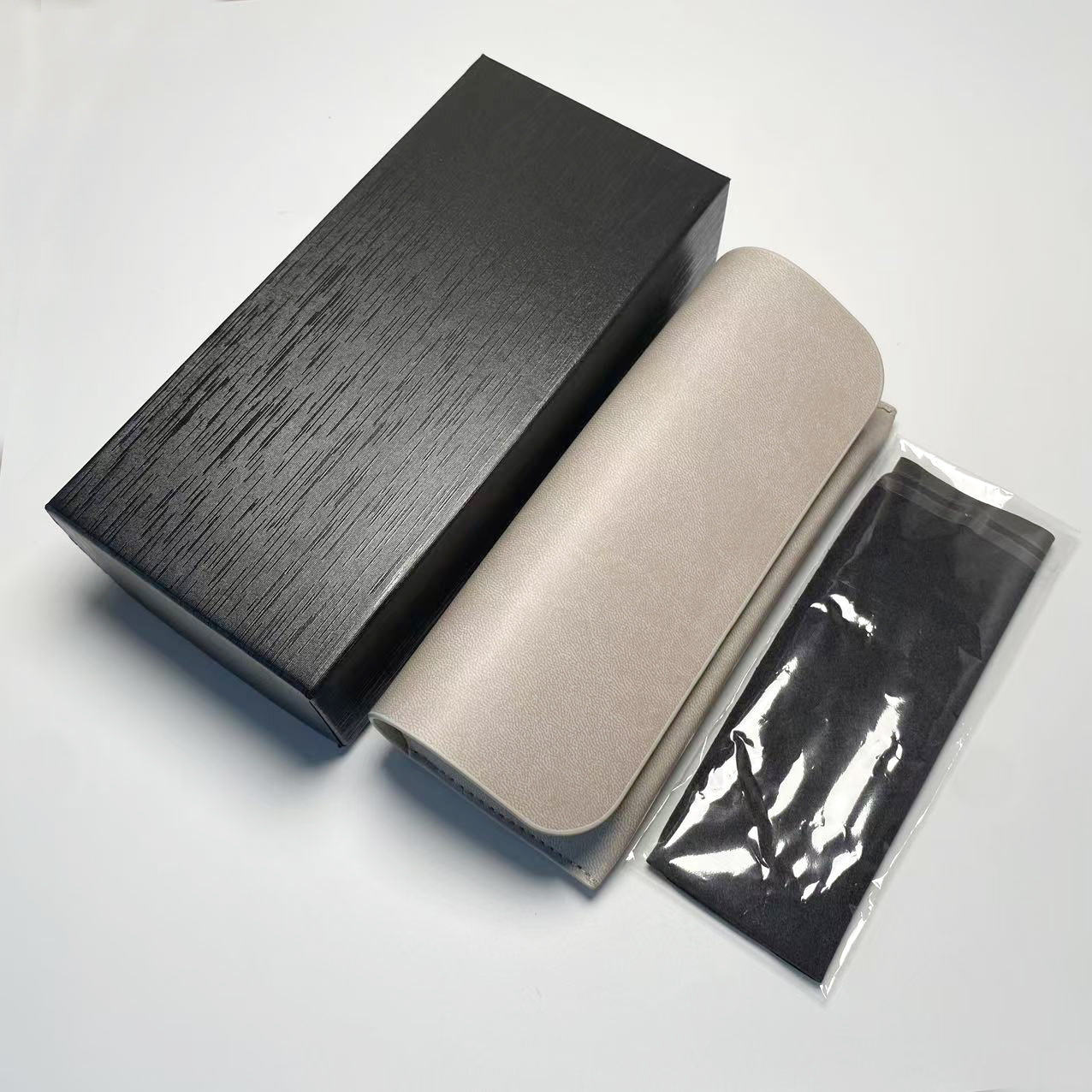 Caja de gafas de alta sensibilidad personalizada paquete de gafas corticales anti-compresión caja de gafas de sol portátil de absorción magnética caja de gafas de sol caja de almacenamiento