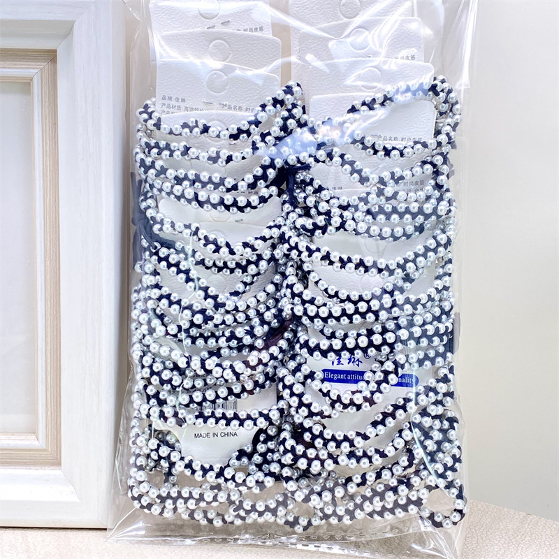 Diadema de perlas tejidas a mano de estilo coreano simple banda de pelo de niña fresca accesorios de pelo de moda de alta elasticidad para mujeres 2 yuanes