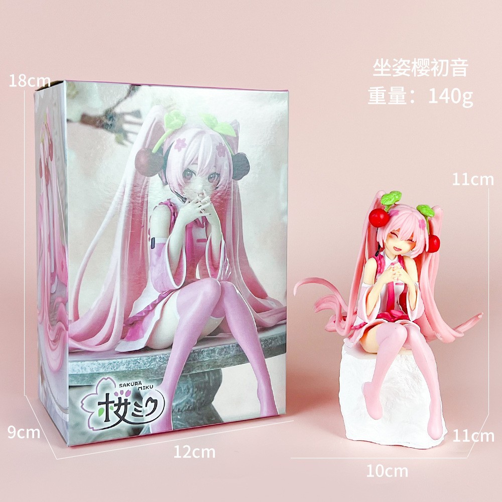 Assis les yeux fermés Sakura Hatsune [en boîte]
