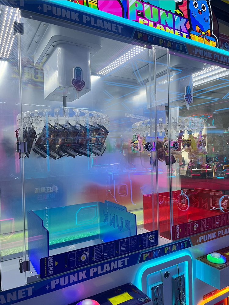 Máquina de clip para agarrar muñecas máquina de juegos máquina de regalos pegatinas caja ciega de entretenimiento comercial fabricante de muñecas mini