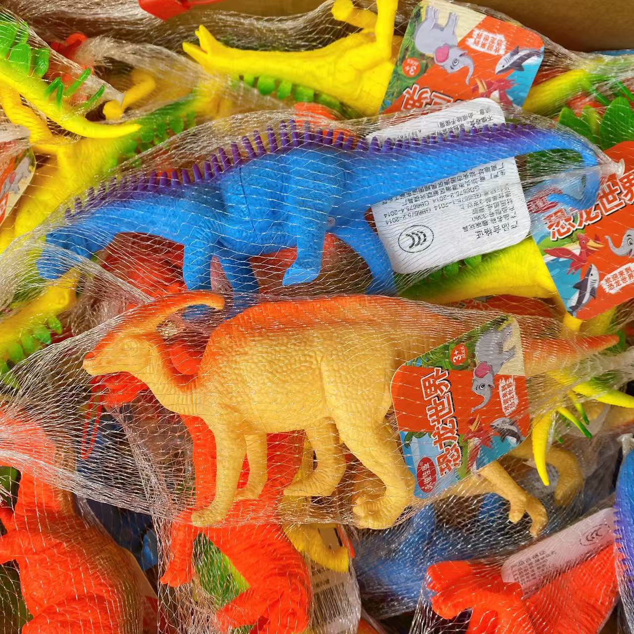 Simulación de animales modelo de dinosaurio de piel sonido juguetes sonidos muñecas de plástico bolsas de red grandes dinosaurios 2 yuanes lotes de departamentos