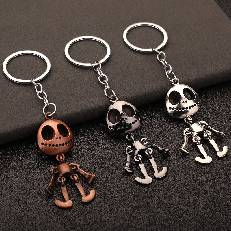 Halloween skull metal keychain movable robot creative jewelry key ring bag pendant wholesale Halloween skull metal keychain movable robot creative jewelry key ring bag pendant wholesale