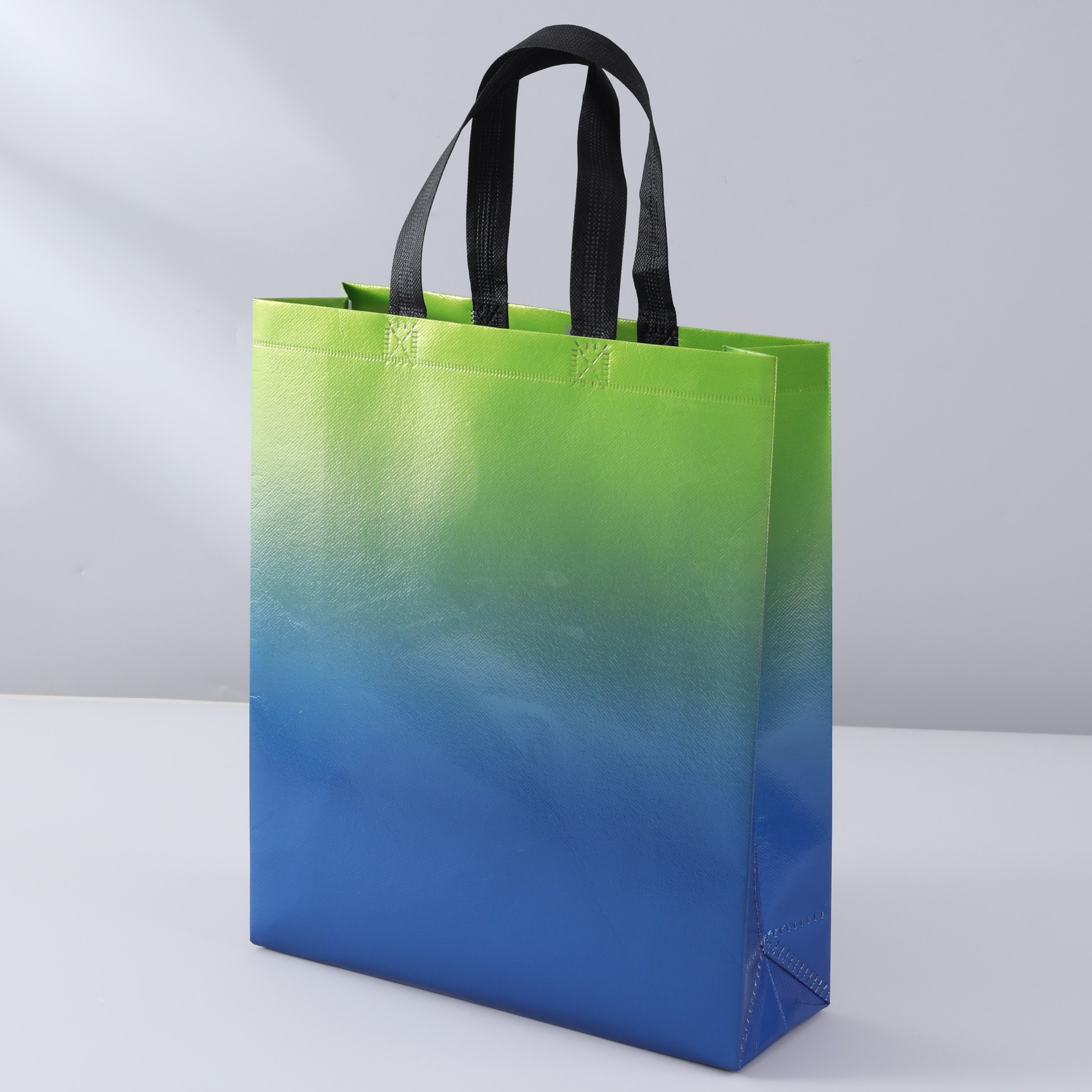 Láser laminado ropa bolsa de embalaje de regalo multicolor no tejido bolsa de publicidad bolso de compras logotipo imprimible