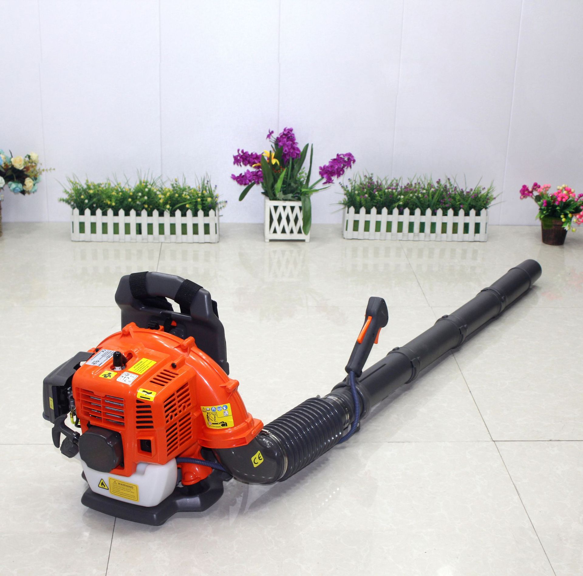 Yingqi ventas directas de fábrica mochila gasolina secador de pelo de efecto invernadero soplador de nieve camino de limpieza extintor de viento