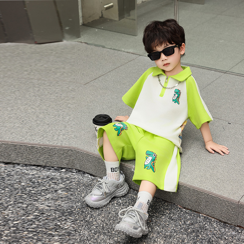 7405 Traje de verano para niños 2025 Nuevo estilo Niño guapo Verano Manga corta POLO Camisa con estampado de dinosaurios Traje de dos piezas
