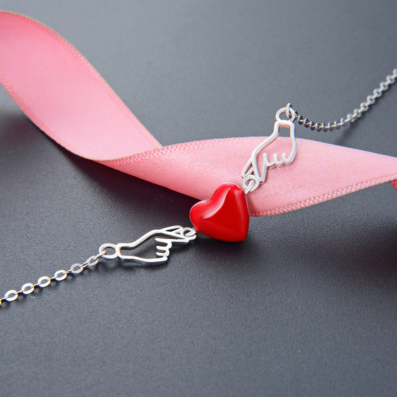 S925 plata esterlina goteo amor pulsera joyas de mano creativas mujeres suministro al por mayor un agente de venta