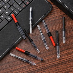 卸売りペン部品押し引き吸墨器回転式吸墨器上墨補助器墨胆墨袋に墨を入れる