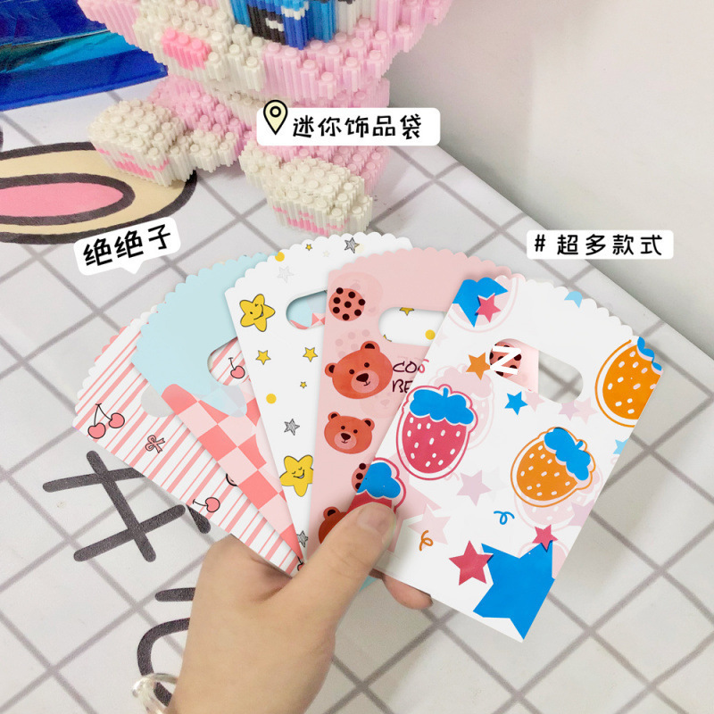 小さいサイズのミニ漫画のビニール袋の逸品のアクセサリーの小さい商品の袋は露店を出して買い物の贈り物の袋の手提げ袋を買います。|undefined