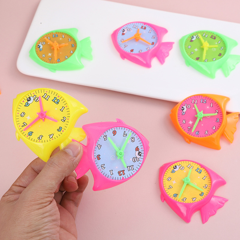 Educación infantil creativa de dibujos animados reloj aprendiz pequeño reloj despertador alrededor de la temporada escolar empujar pequeños regalos
